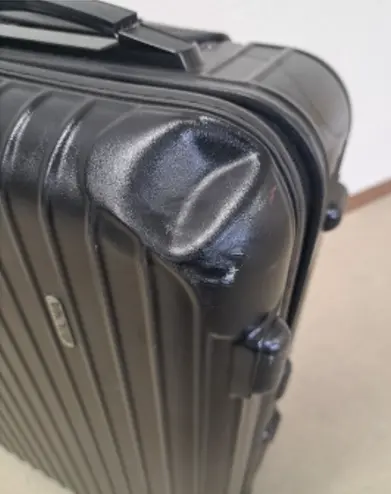 RIMOWA ボディ凹み修理（アルミケース補修）
