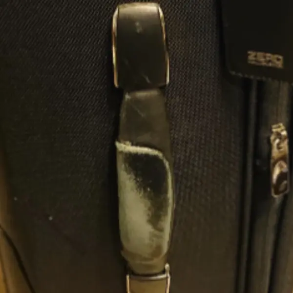 TUMI 革ハンドル修理