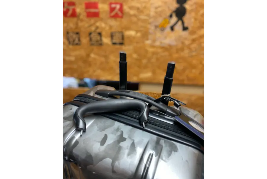 TUMIのファスナー修理前